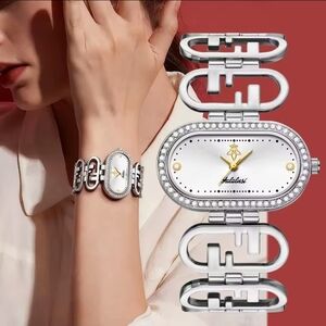 Anthropologie Elegant Silver Watch with Gold Details